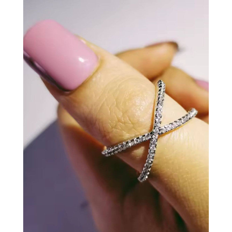 ANELLO IN ACCIAIO INTRECCIO CON ZIRCONI