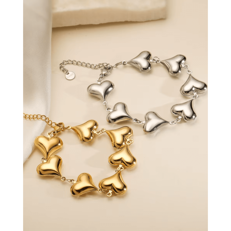 SET COLLANA E BRACCIALE CUORI BOMBATI
